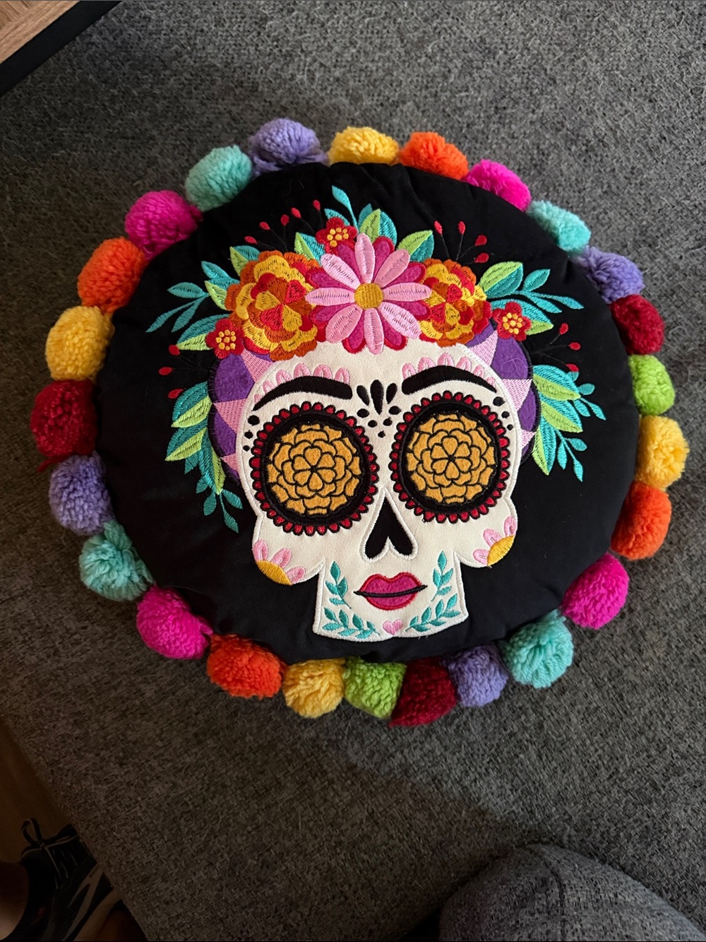 Embroidered Sugar Skull Round Pillow with Colorful Pom-Pom Trim